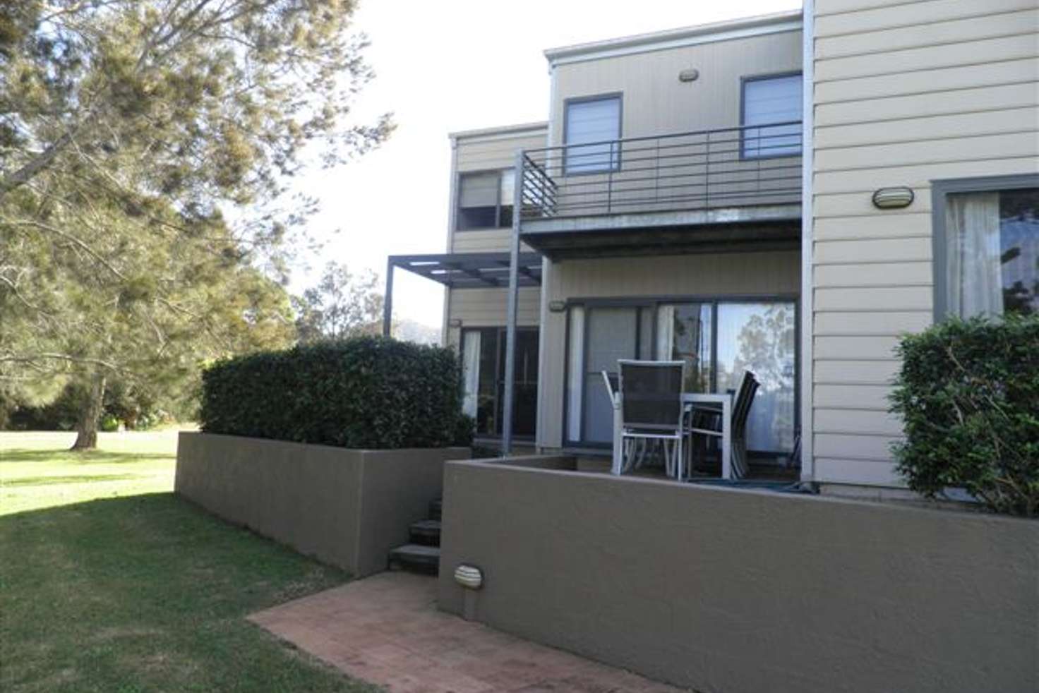 Main view of Homely townhouse listing, 7/10-14 Daintree Drive, Korora NSW 2450