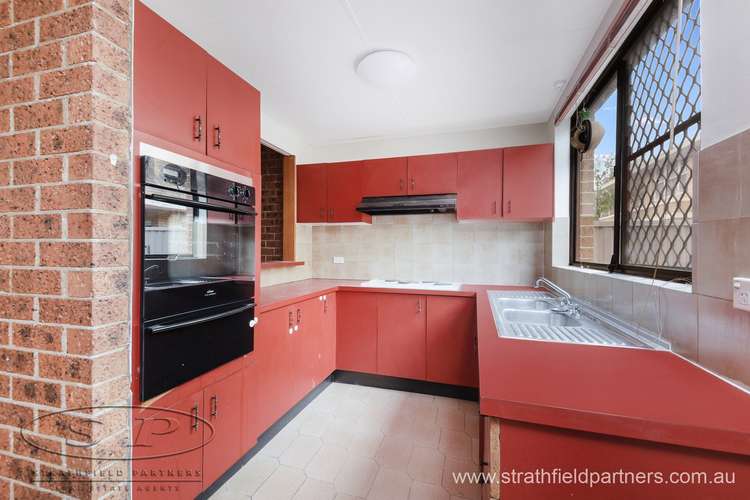 Main view of Homely townhouse listing, 1/22 Burlington Road, Homebush NSW 2140