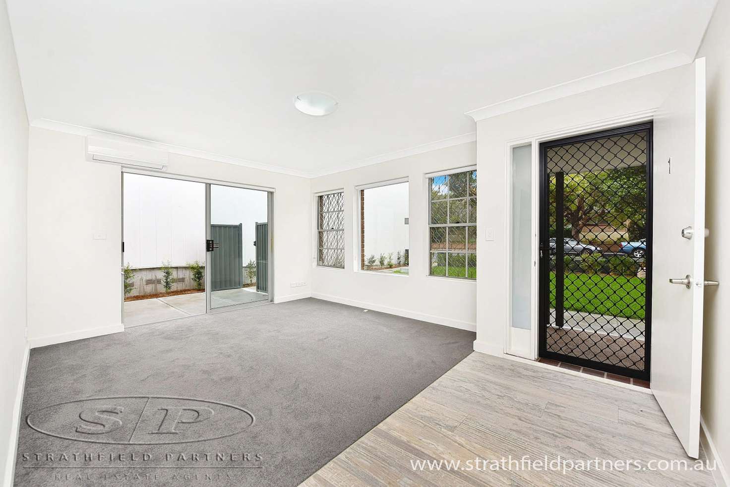 Main view of Homely townhouse listing, 1/27 Churchill Avenue, Strathfield NSW 2135