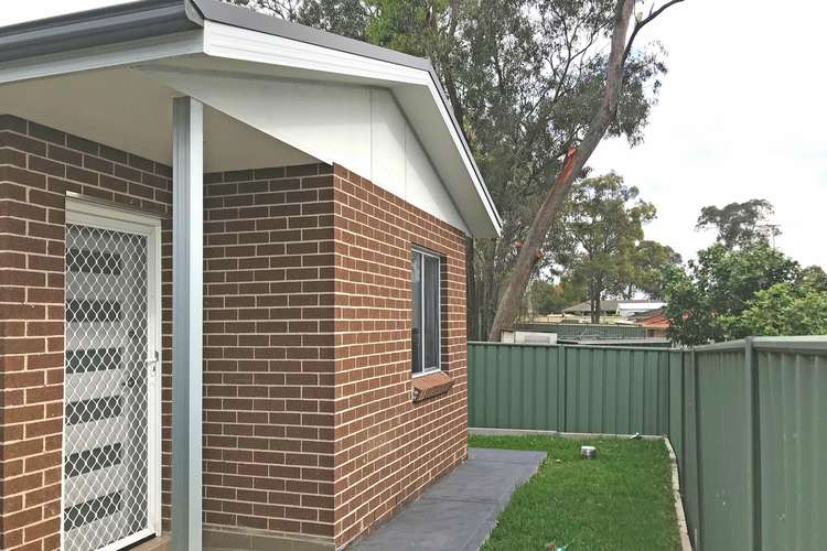 Main view of Homely villa listing, 33A Welling Drive, Mount Annan NSW 2567