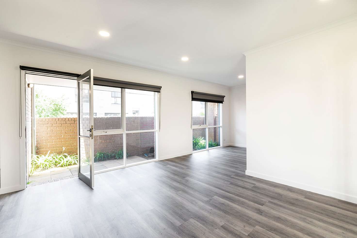 Main view of Homely townhouse listing, 1/248 Dandenong Road, St Kilda East VIC 3183