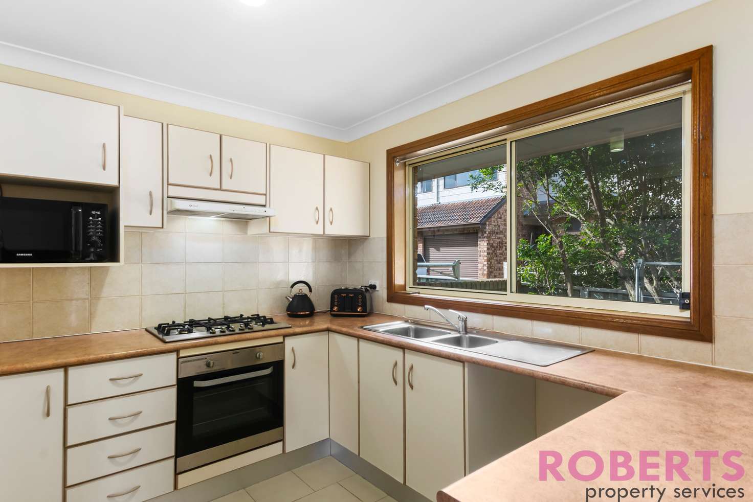 Main view of Homely townhouse listing, 1/25 Nicholson Road, Woonona NSW 2517