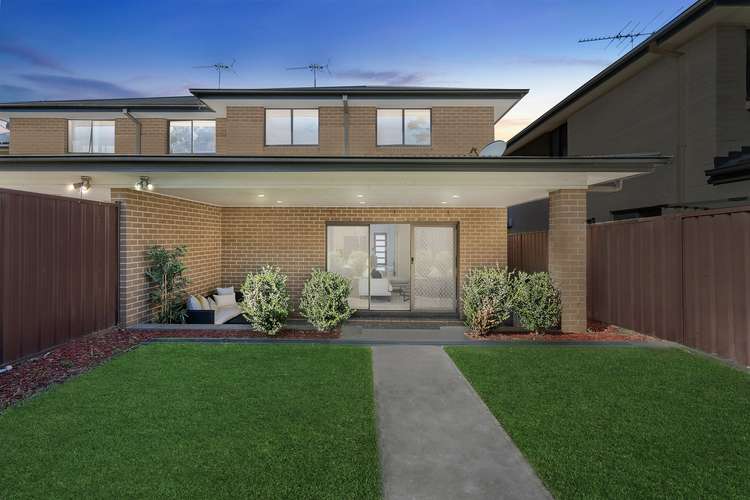 Main view of Homely semiDetached listing, 661 Henry Lawson Drive, East Hills NSW 2213