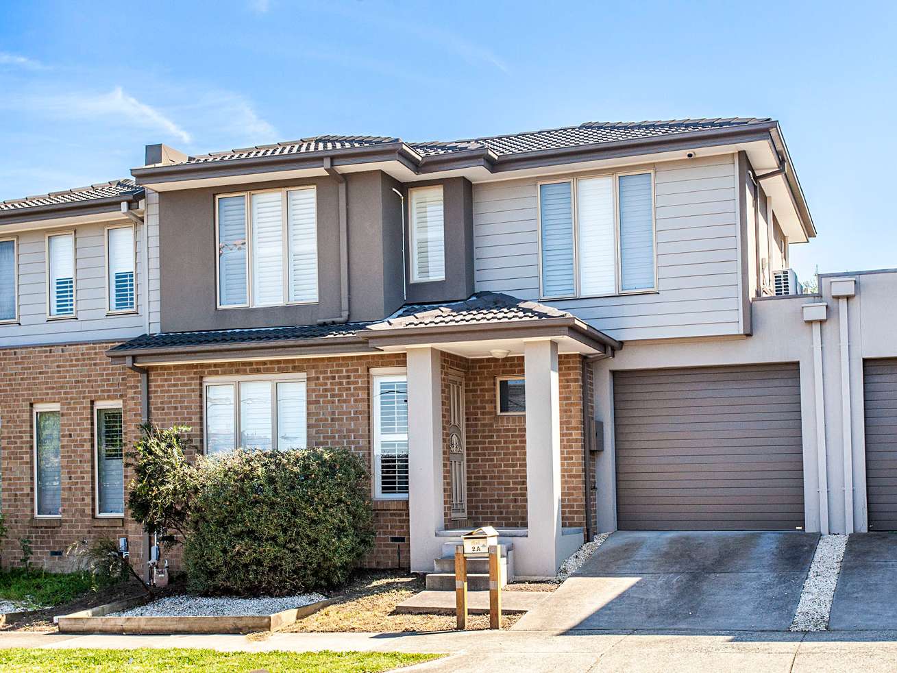 Main view of Homely townhouse listing, 2A Douglas Avenue, Box Hill South VIC 3128