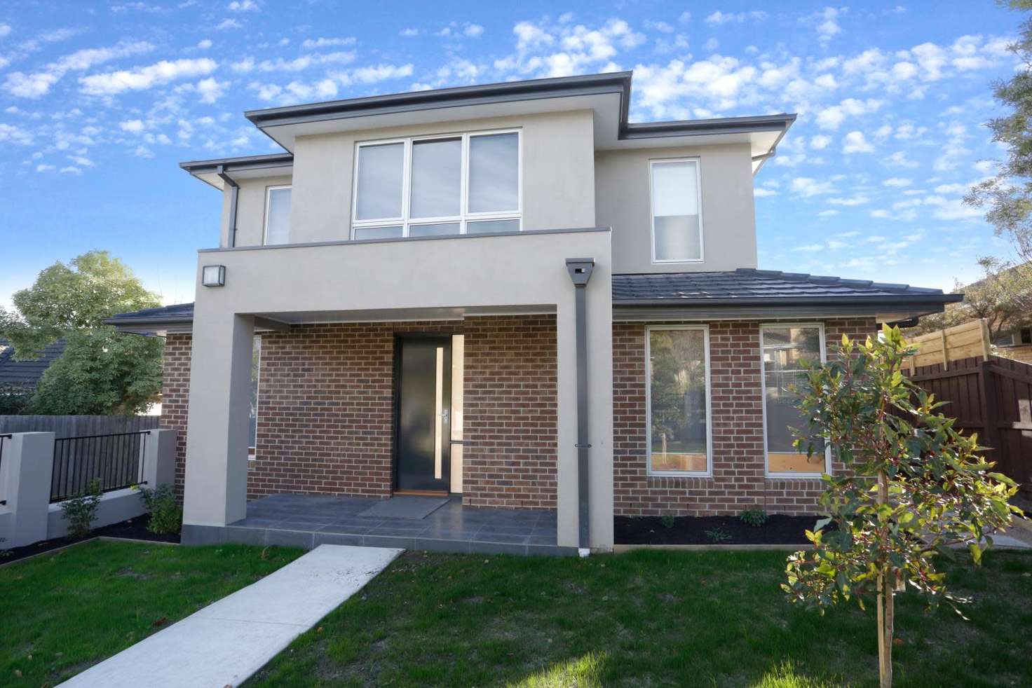 Main view of Homely townhouse listing, 1/21 Raymond Street, Ashwood VIC 3147