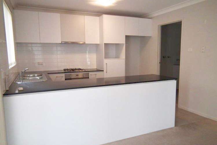 Main view of Homely townhouse listing, 13 Wenton Road, Holsworthy NSW 2173