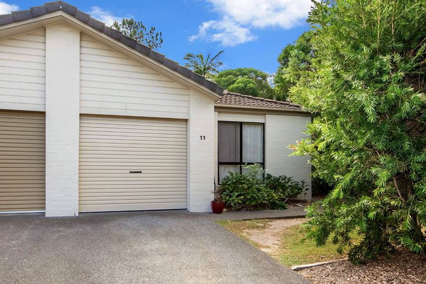 Main view of Homely villa listing, 11/590 Pine Ridge Road, Coombabah QLD 4216