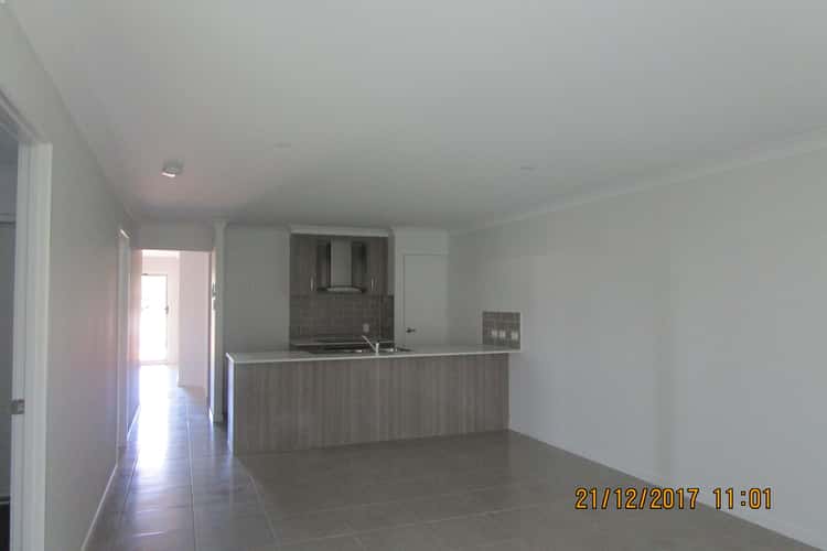 Second view of Homely semiDetached listing, 2/6 Tulipwood, Coral Cove QLD 4670
