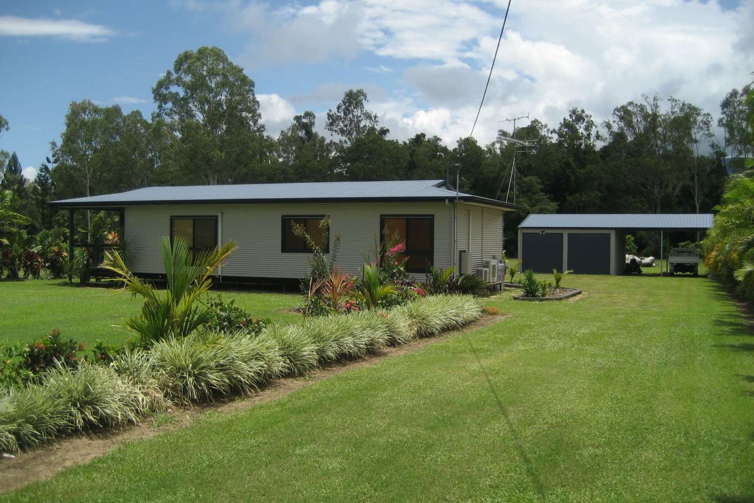 Main view of Homely acreageSemiRural listing, 11 Curtis Road, Carruchan QLD 4816