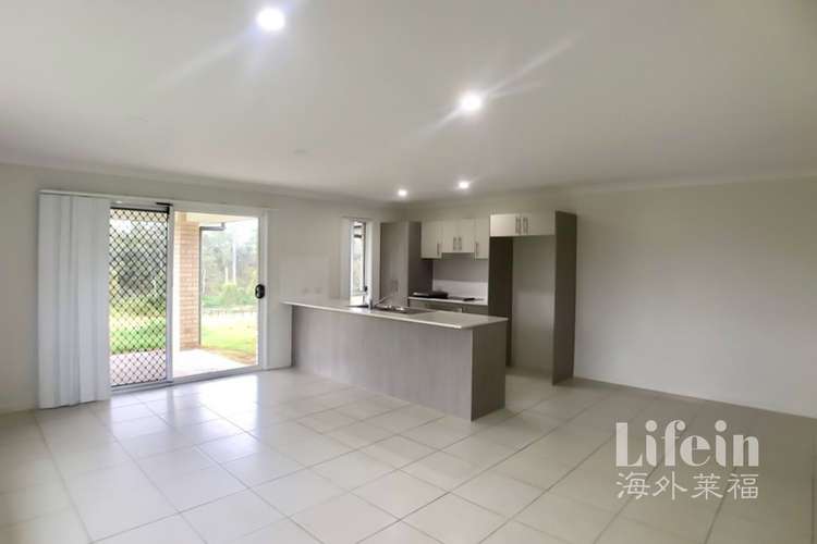 Third view of Homely house listing, 1/70 Waterfront Drive, Karalee QLD 4306