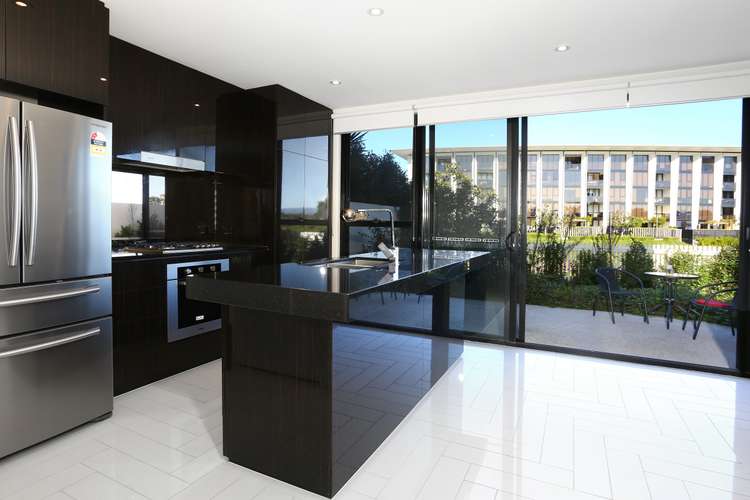 Main view of Homely townhouse listing, 7 THEATRE DRIVE, Benowa QLD 4217