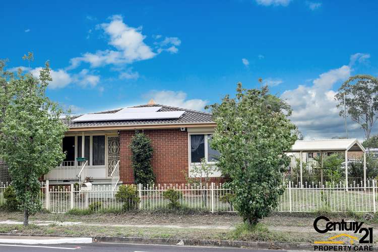 Main view of Homely house listing, 1 Wilga Place, Macquarie Fields NSW 2564