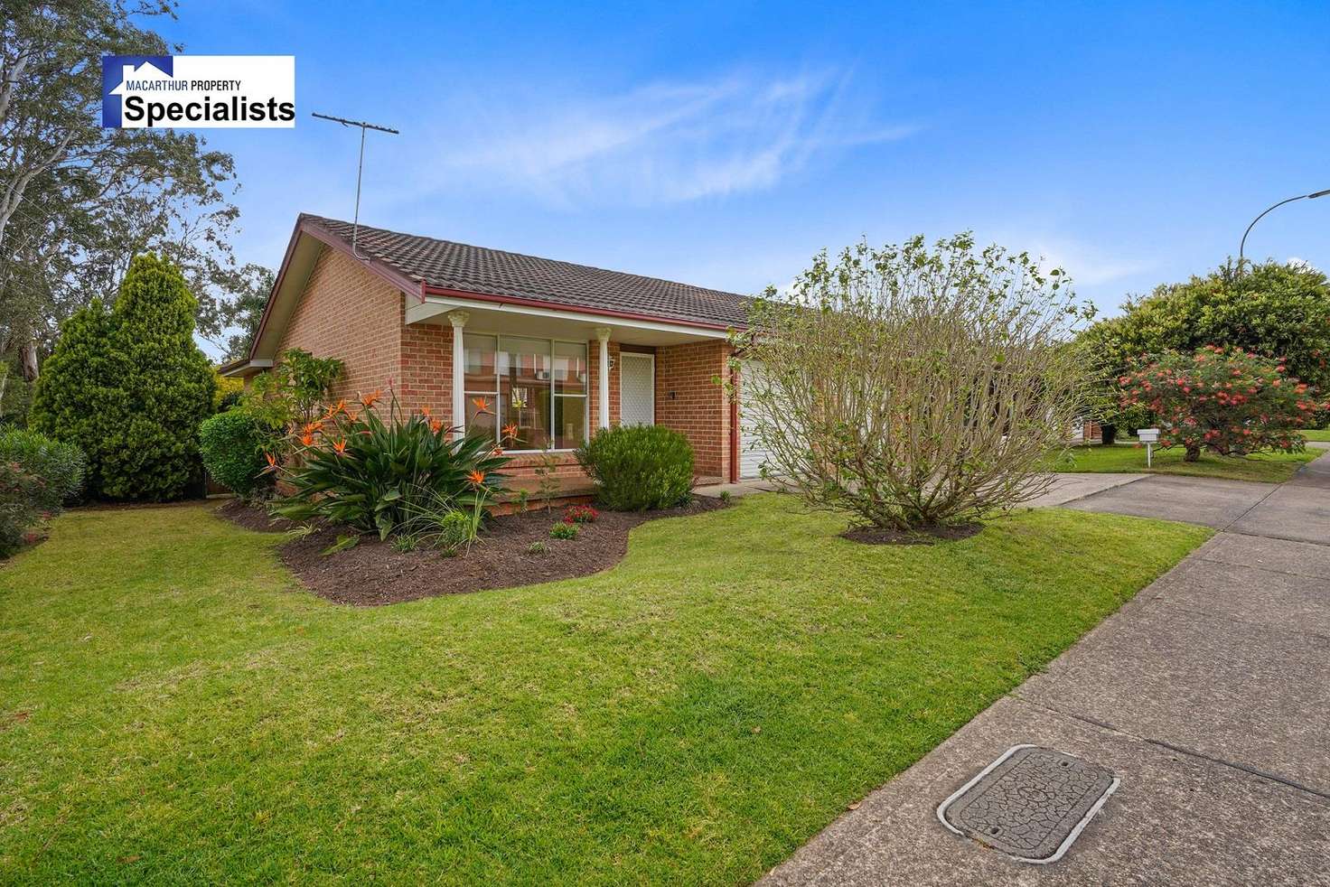 Main view of Homely villa listing, 1/67 Fuchsia Crescent, Macquarie Fields NSW 2564