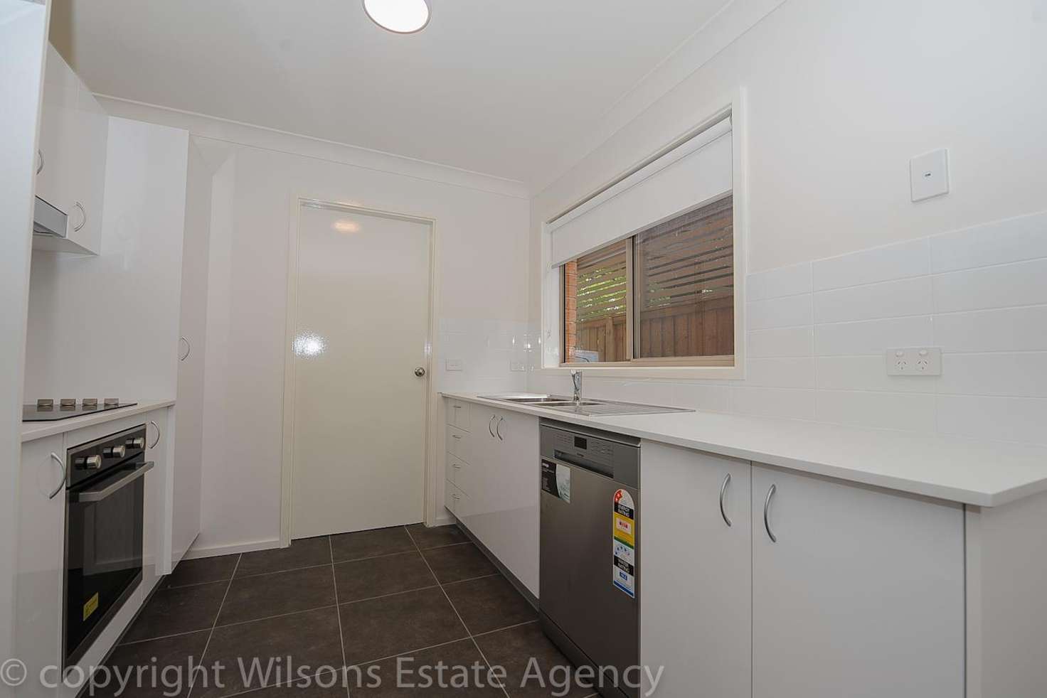 Main view of Homely townhouse listing, 1/251 Booker Bay Road, Booker Bay NSW 2257