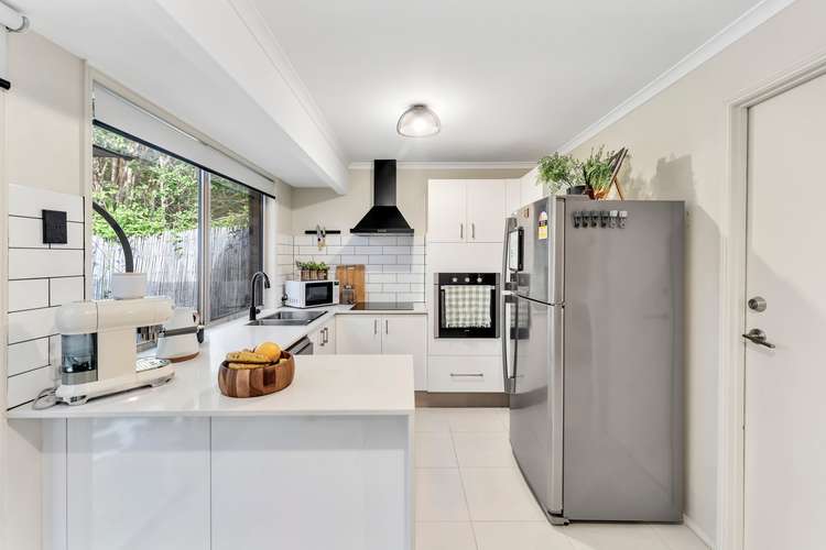 Main view of Homely townhouse listing, 11/1-21 Golden Palms Court, Ashmore QLD 4214
