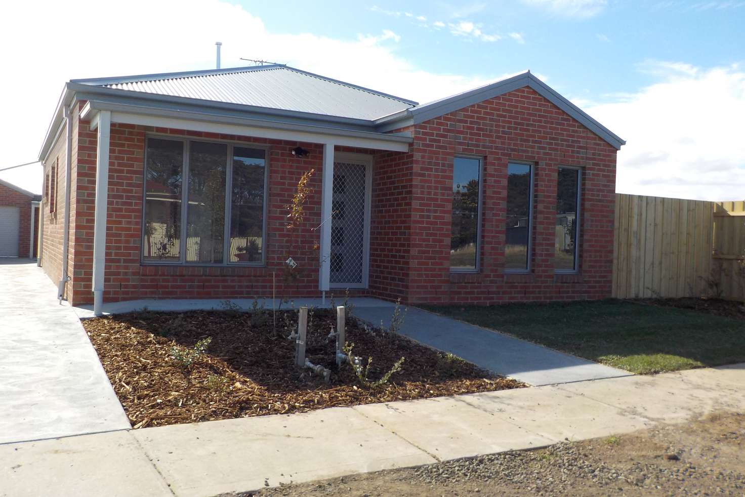 Main view of Homely townhouse listing, 1/2 Central Park Court, Ballan VIC 3342