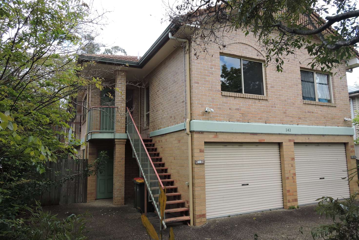Main view of Homely townhouse listing, 1/242 Sir Fred Schonell Drive, St Lucia QLD 4067