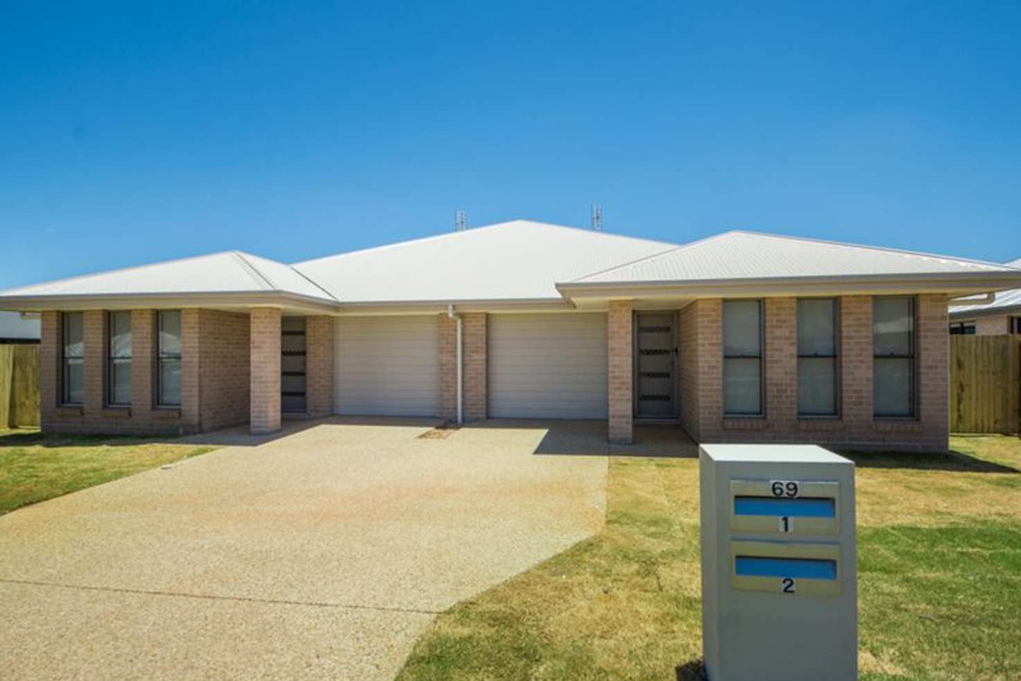 Main view of Homely semiDetached listing, 1 & 2/69 Sanctuary Drive, Cranley QLD 4350