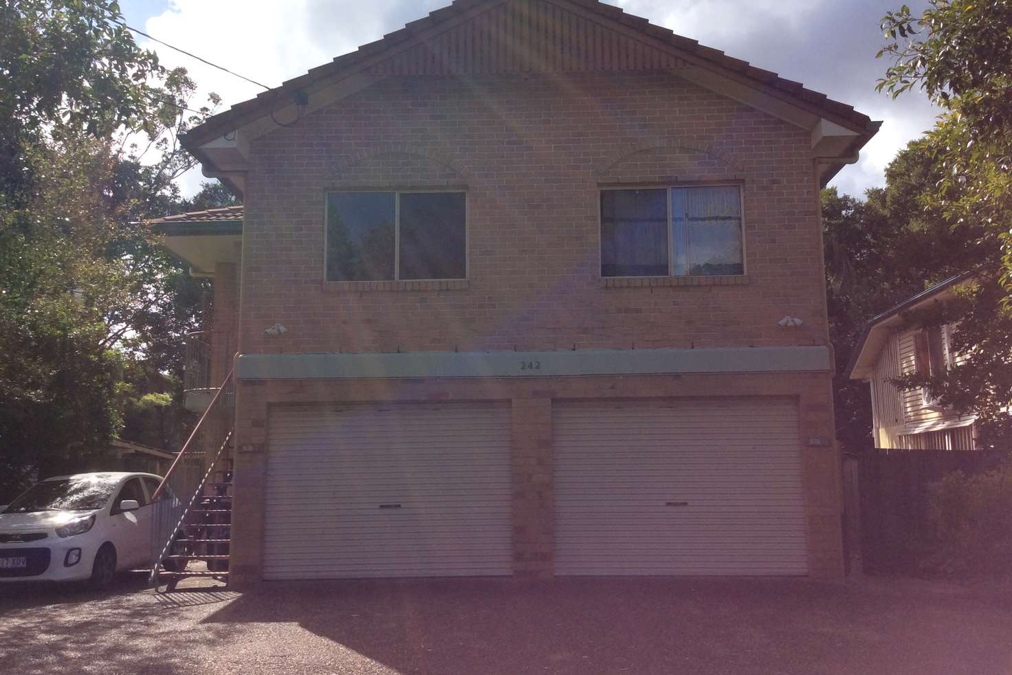 Main view of Homely townhouse listing, 1/242 Sir Fred Schonell Drive, St Lucia QLD 4067