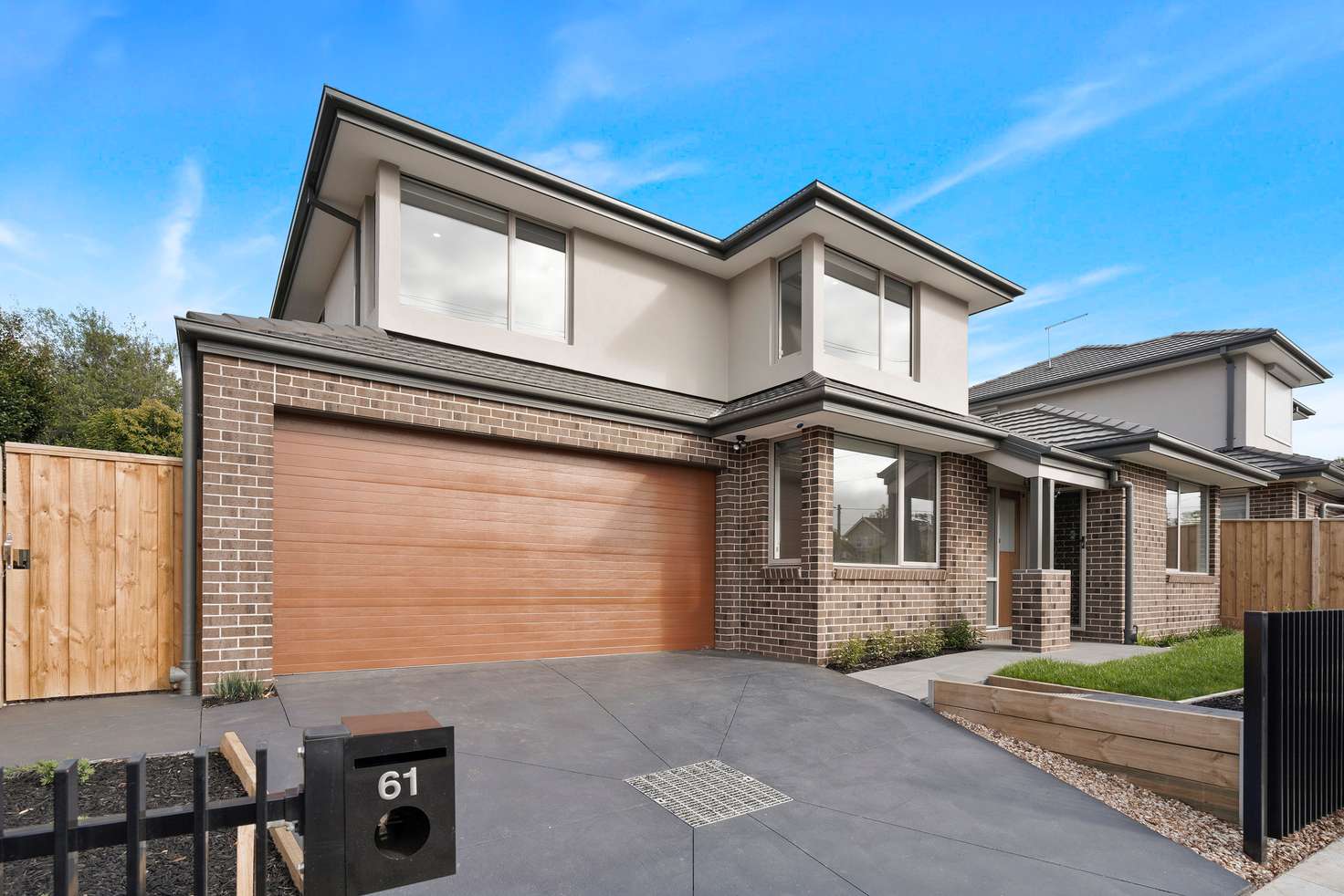 Main view of Homely townhouse listing, 61 Oriel Road, Ivanhoe VIC 3079
