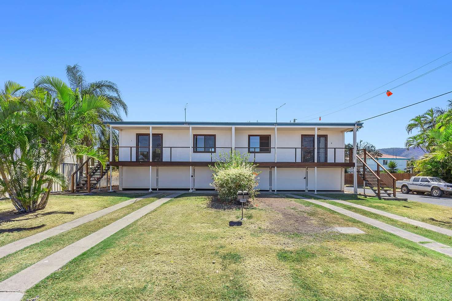 Main view of Homely semiDetached listing, Unit 1 & 2/111 Rodboro Street, Berserker QLD 4701