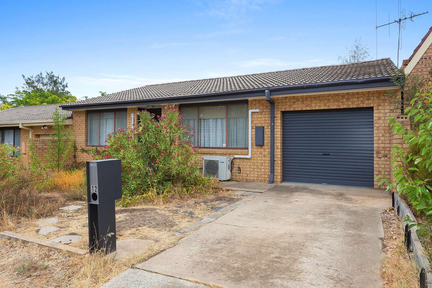 Main view of Homely townhouse listing, 12 Macfarlan Place, Latham ACT 2615