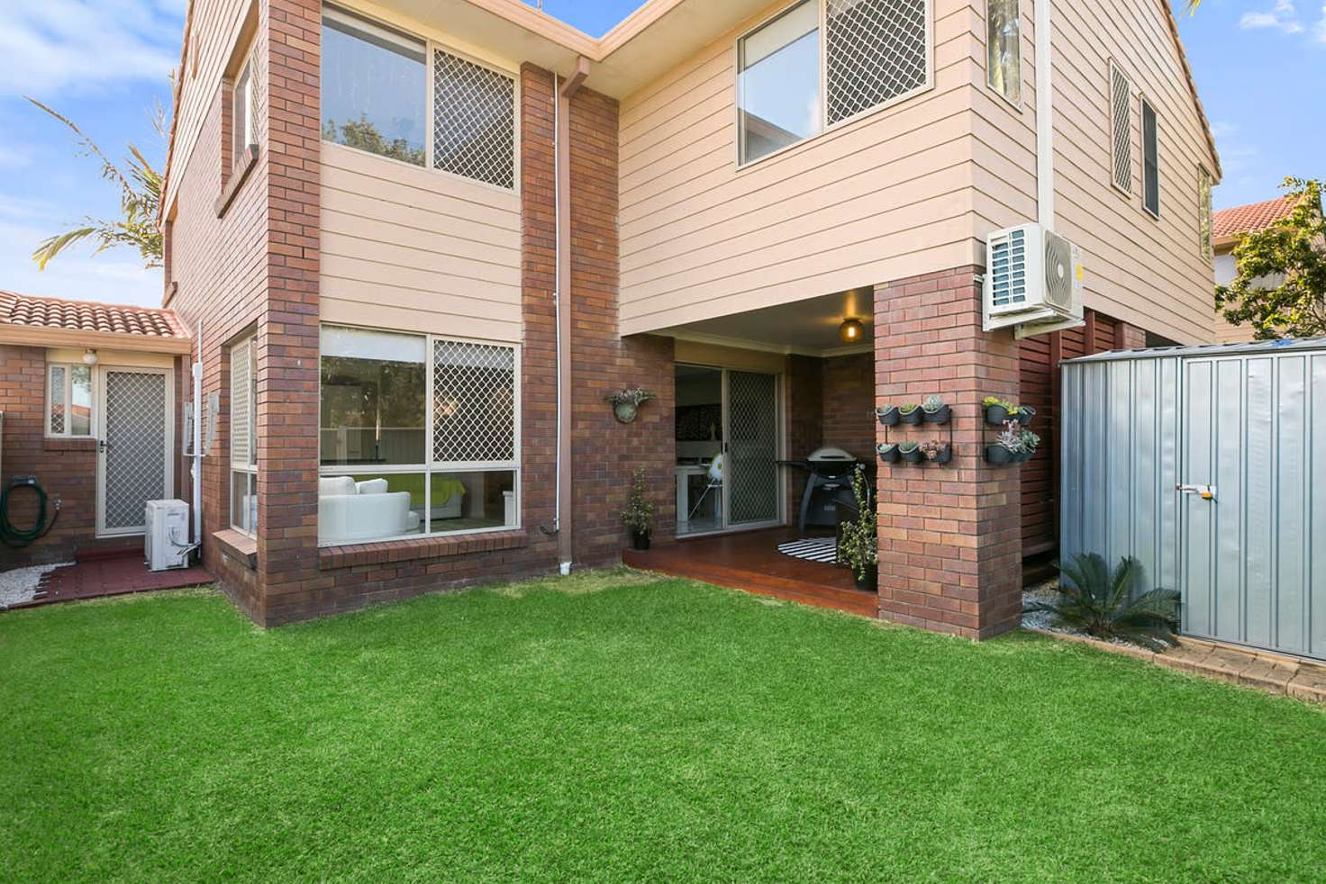 Main view of Homely townhouse listing, 90/601 Pine Ridge Road, Biggera Waters QLD 4216
