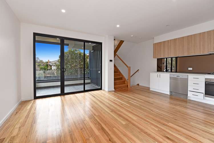 Main view of Homely townhouse listing, 1/34 Bulla  Road, Strathmore VIC 3041