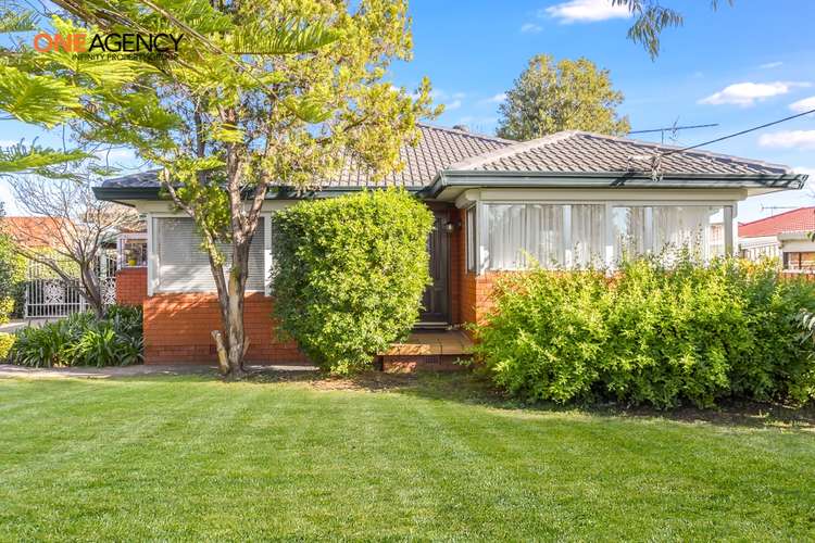 Main view of Homely house listing, 1 Kenneth Street, Macquarie Fields NSW 2564