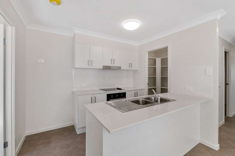 Main view of Homely semiDetached listing, 1/8A Burton Court, Boronia Heights QLD 4124