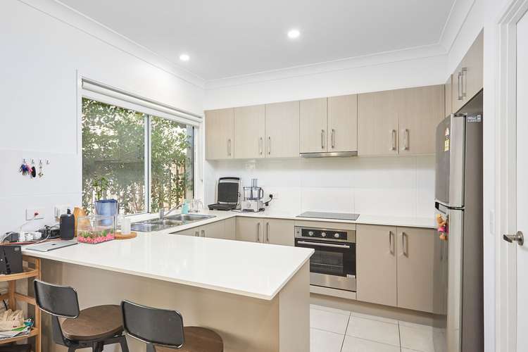 Main view of Homely townhouse listing, 9/8 Riverstone Road, Helensvale QLD 4212