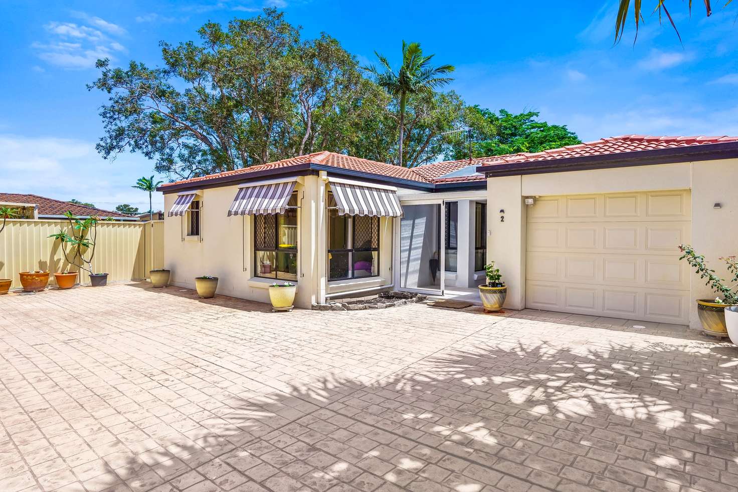 Main view of Homely townhouse listing, 2/10 Alkira Avenue, Palm Beach QLD 4221