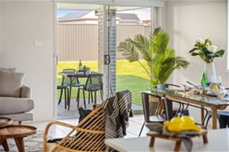 Main view of Homely townhouse listing, 6 Tourmaline Drive, Rutherford NSW 2320