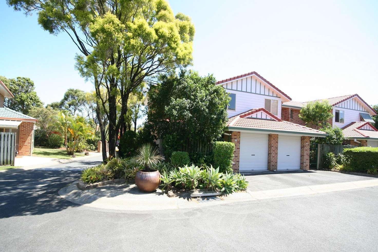 Main view of Homely townhouse listing, 1/17-21 Monterey Avenue, Banora Point NSW 2486