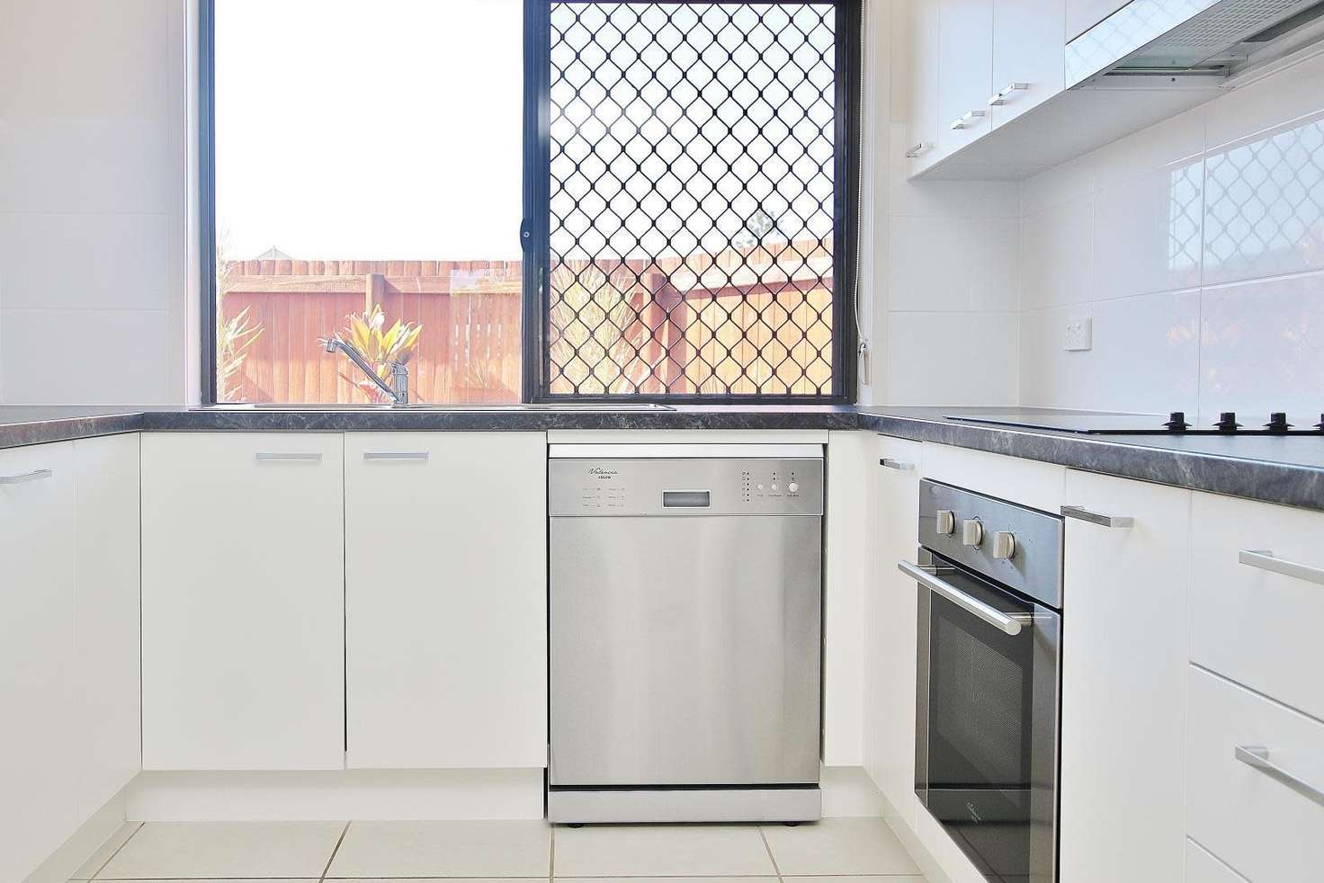 Main view of Homely townhouse listing, 1/71 Richmond Street, Berserker QLD 4701