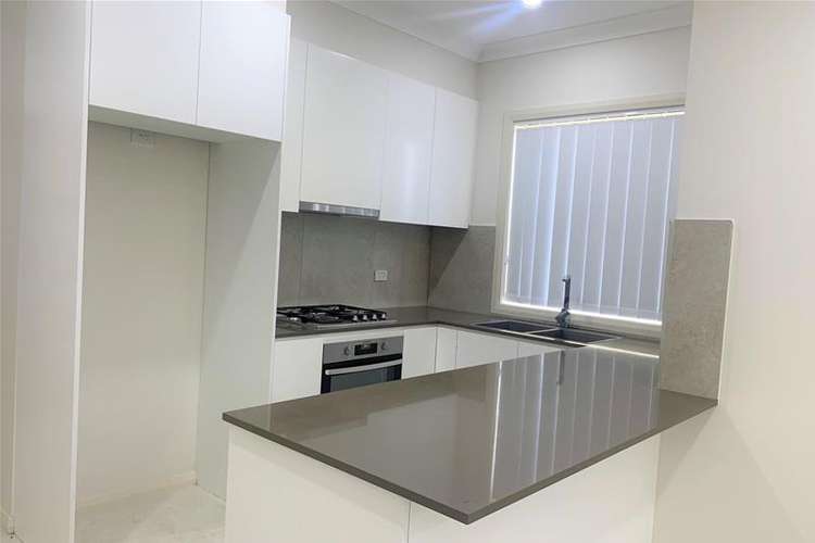 Main view of Homely townhouse listing, 1/23 Tungarra Road, Girraween NSW 2145