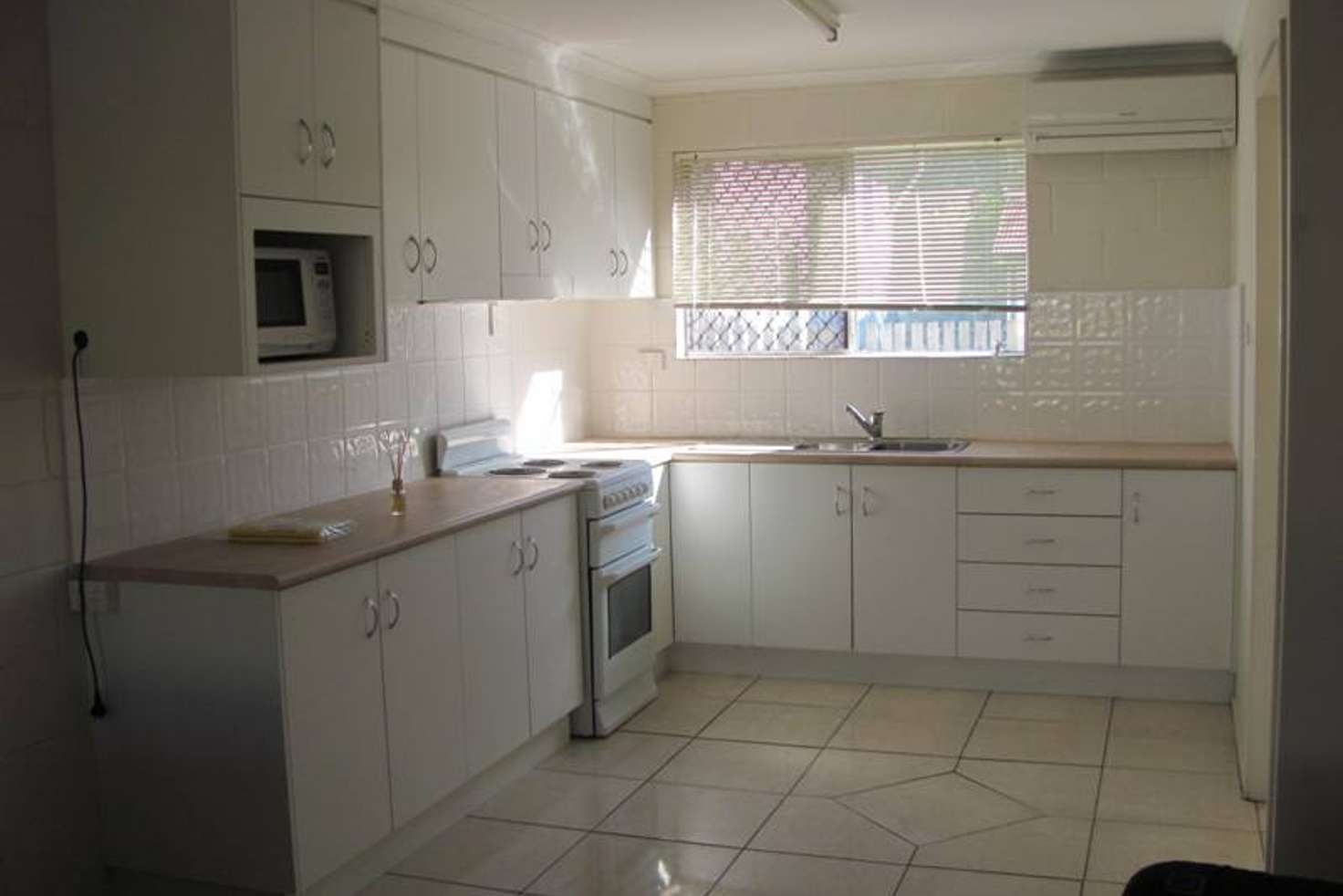 Main view of Homely townhouse listing, 4/4 Mylne street, West Gladstone QLD 4680