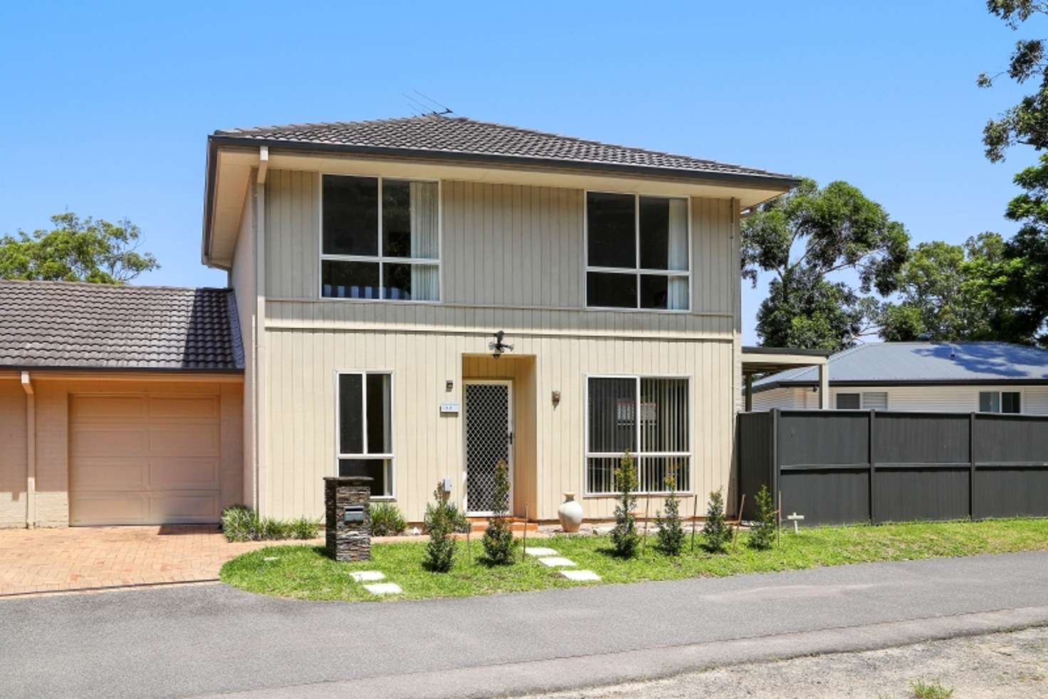 Main view of Homely townhouse listing, 1/1 Warwick Street, Blackwall NSW 2256