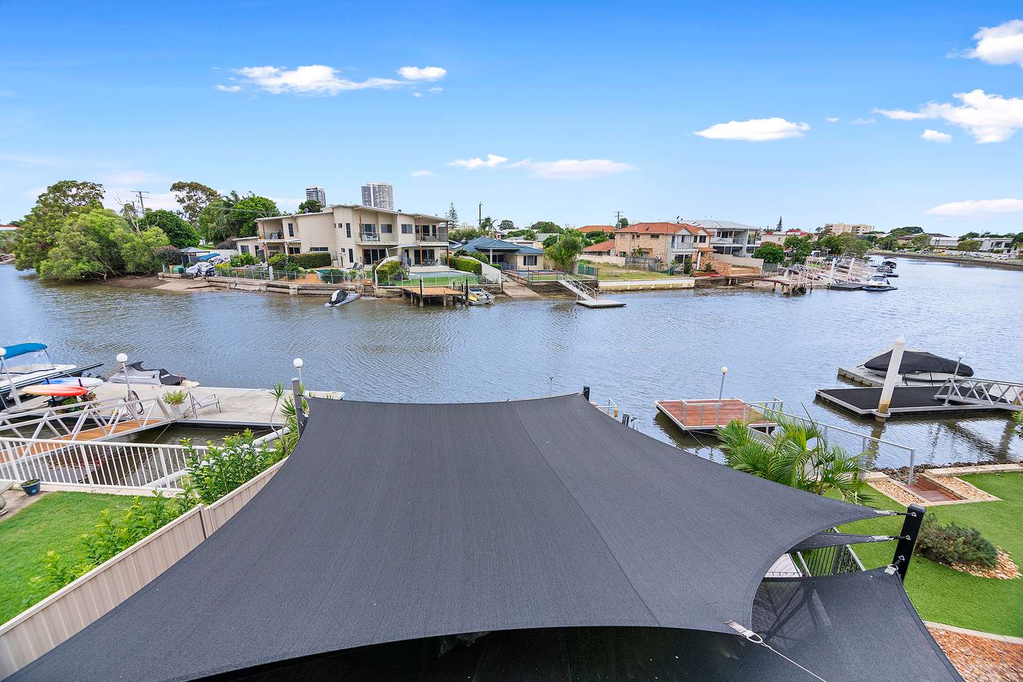 Main view of Homely townhouse listing, 1/55 Hollywell Road, Biggera Waters QLD 4216