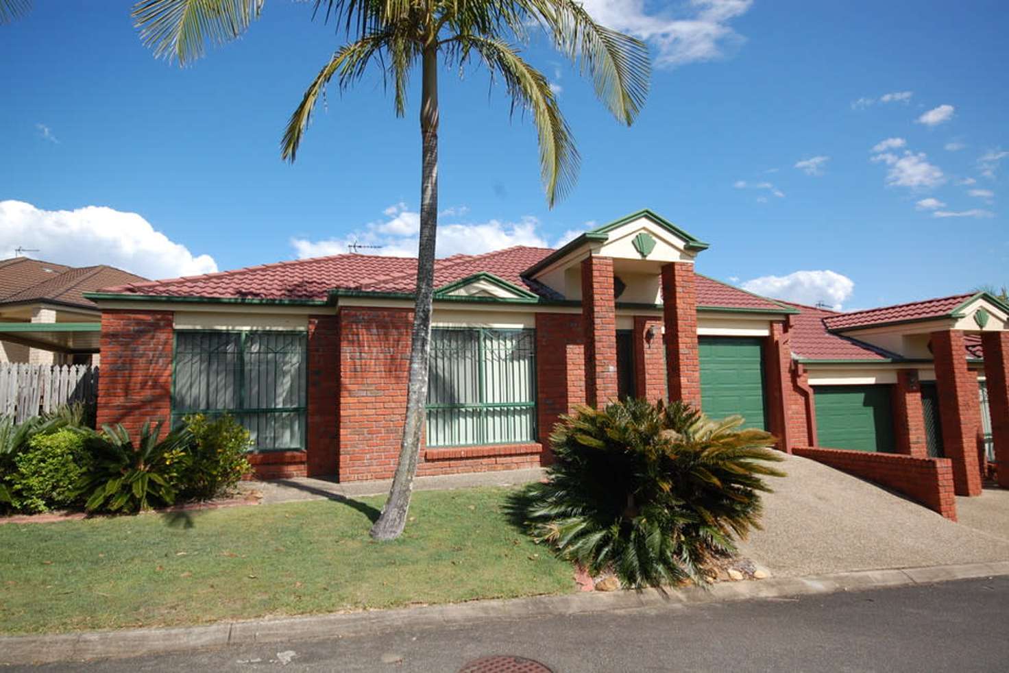 Main view of Homely villa listing, 21/442 Pine Ridge Road, Coombabah QLD 4216