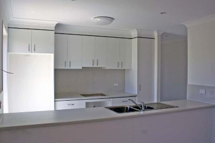 Second view of Homely townhouse listing, 1/15 Barradeen Cct, Pacific Pines QLD 4211