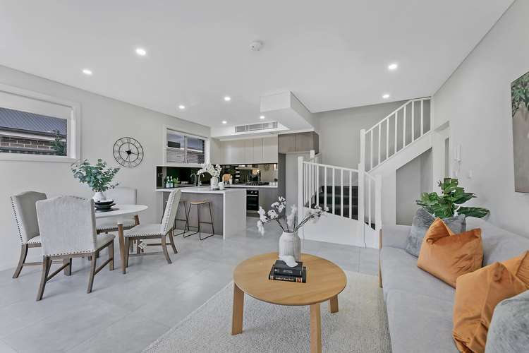 Main view of Homely townhouse listing, 1/213 Targo Road, Girraween NSW 2145