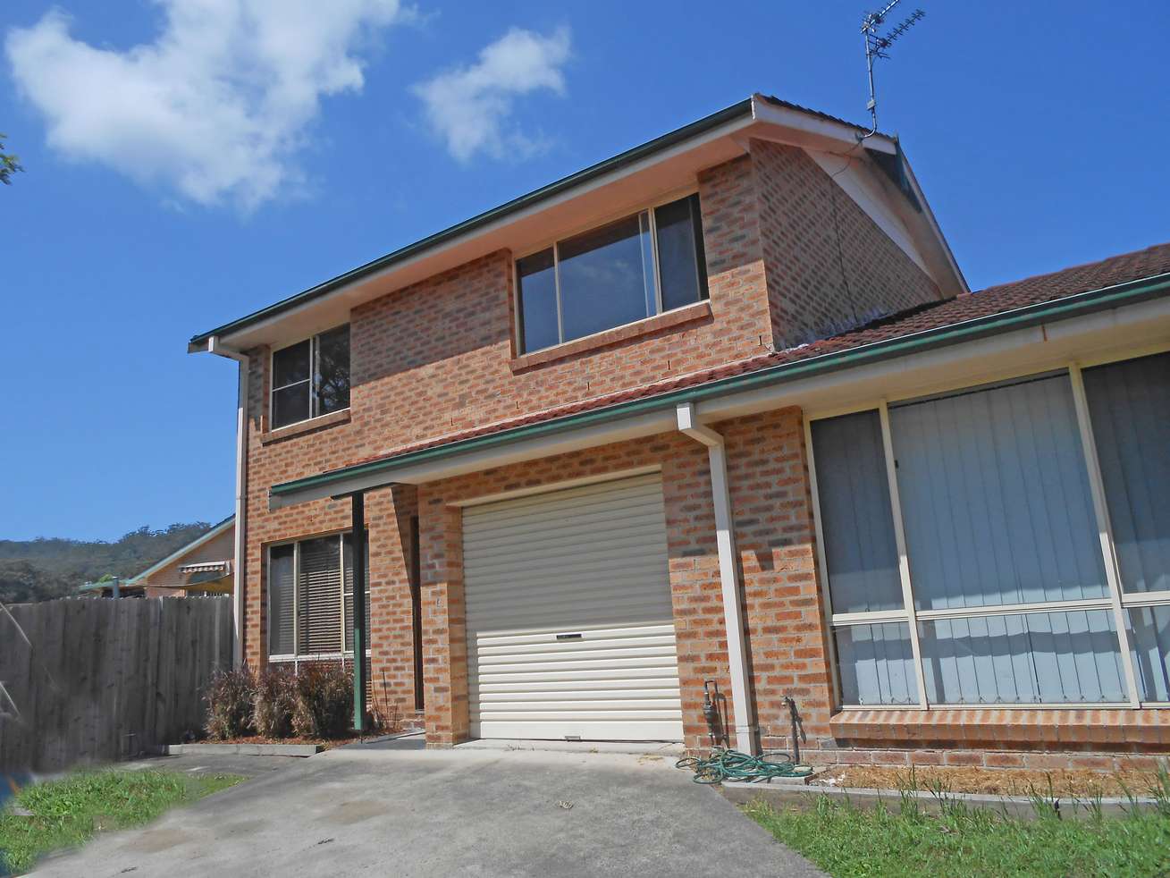 Main view of Homely townhouse listing, 1/22 Christle Street, Green Point NSW 2251