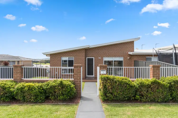 Main view of Homely townhouse listing, 1/102 Kanahooka Road, Kanahooka NSW 2530