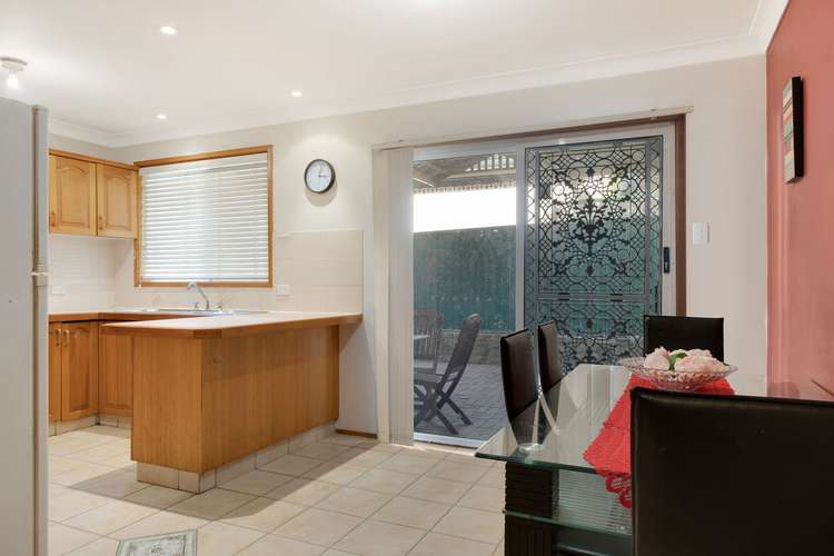 Third view of Homely townhouse listing, 1/12 Parliament Road, Macquarie Fields NSW 2564