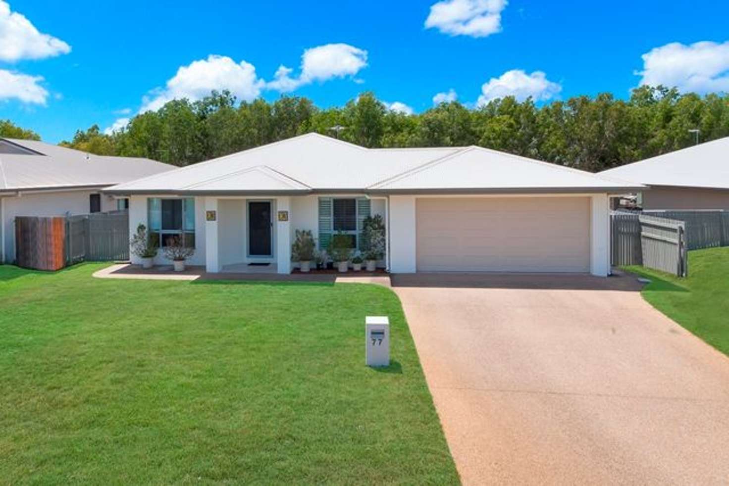 Main view of Homely house listing, 77 Daintree Drive, Bushland Beach QLD 4818