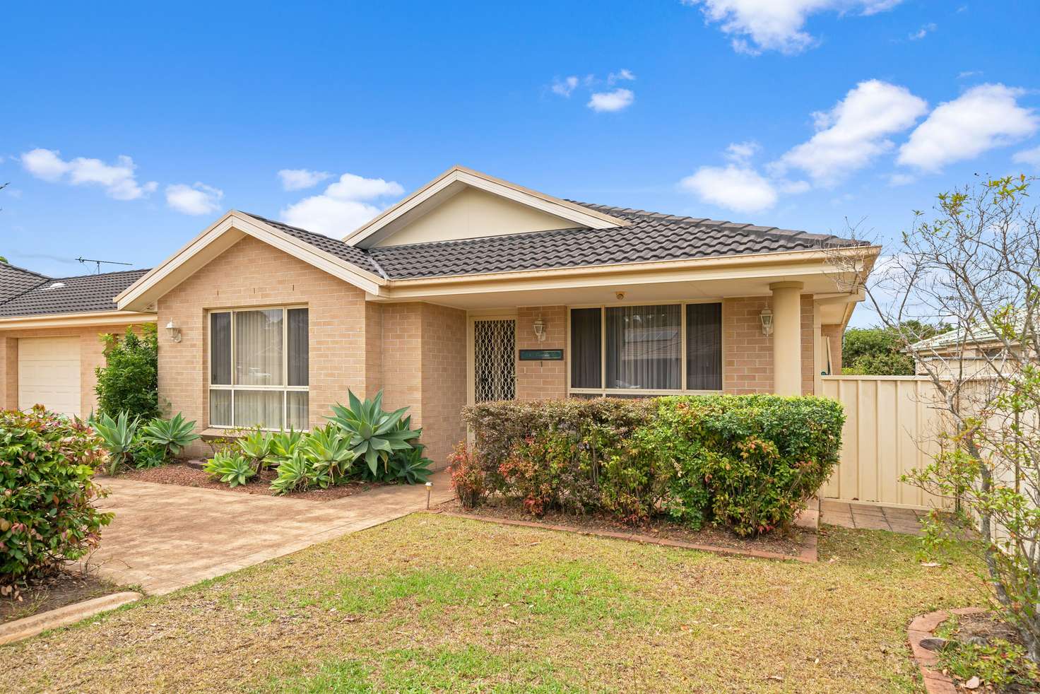 Main view of Homely townhouse listing, 1/20 Freesia Crescent, Bomaderry NSW 2541