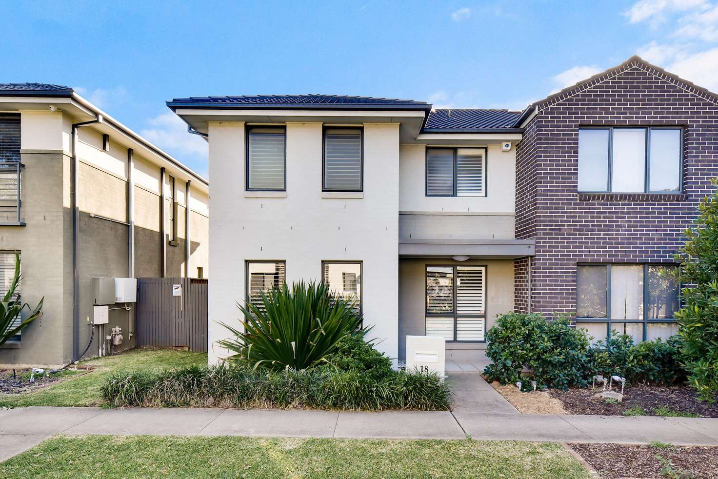 Main view of Homely semiDetached listing, 18 Mariner Street, Glenfield NSW 2167