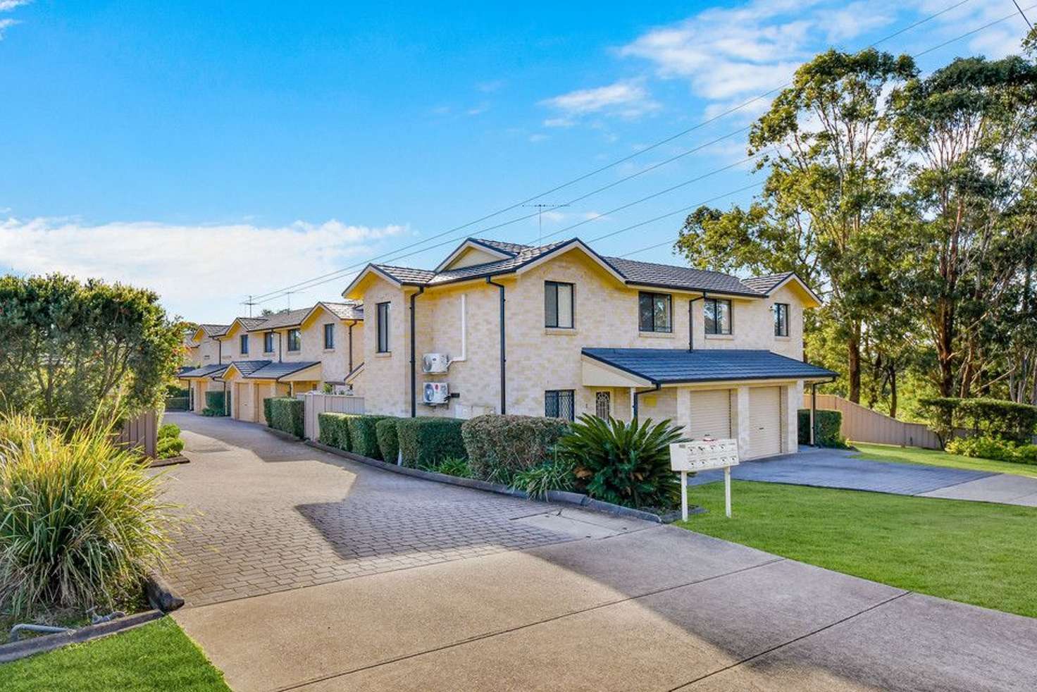 Main view of Homely townhouse listing, 1/10-14 Eagleview Road, Minto NSW 2566