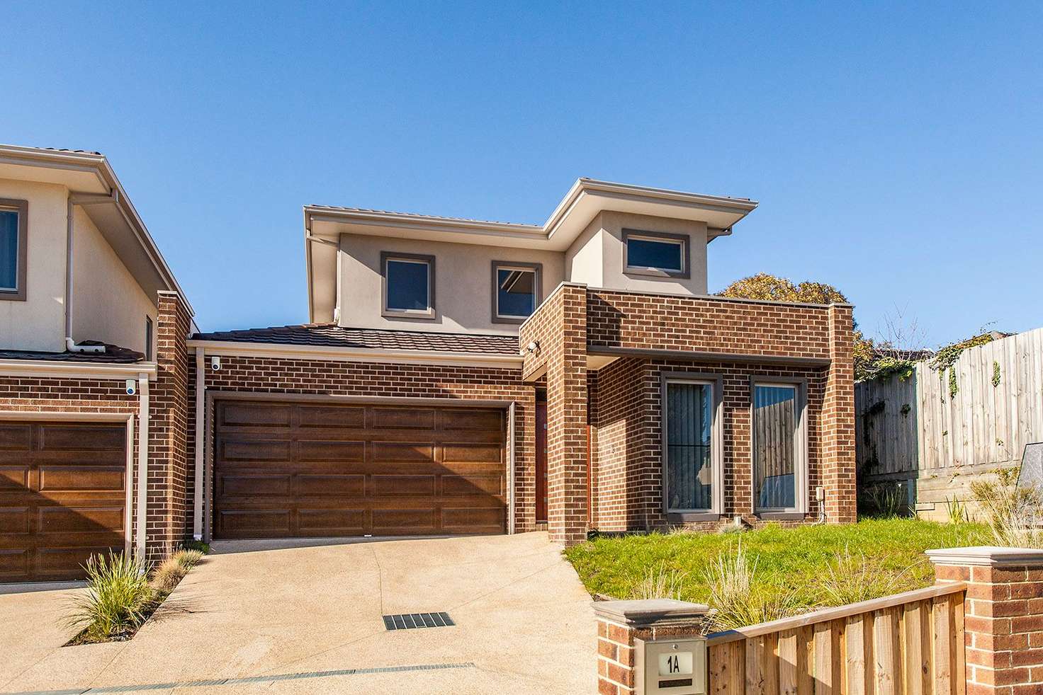 Main view of Homely townhouse listing, 1a Haldane Court, Doncaster East VIC 3109